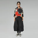 BUNTE, TIEFE BLUSE MIT V-AUSSCHNITT