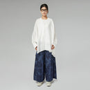 DENIM TROUSERS WITH ROSES PRINT