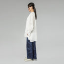 DENIM TROUSERS WITH ROSES PRINT
