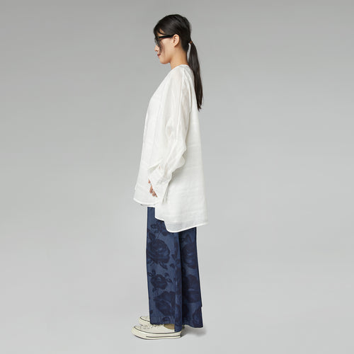 DENIM TROUSERS WITH ROSES PRINT