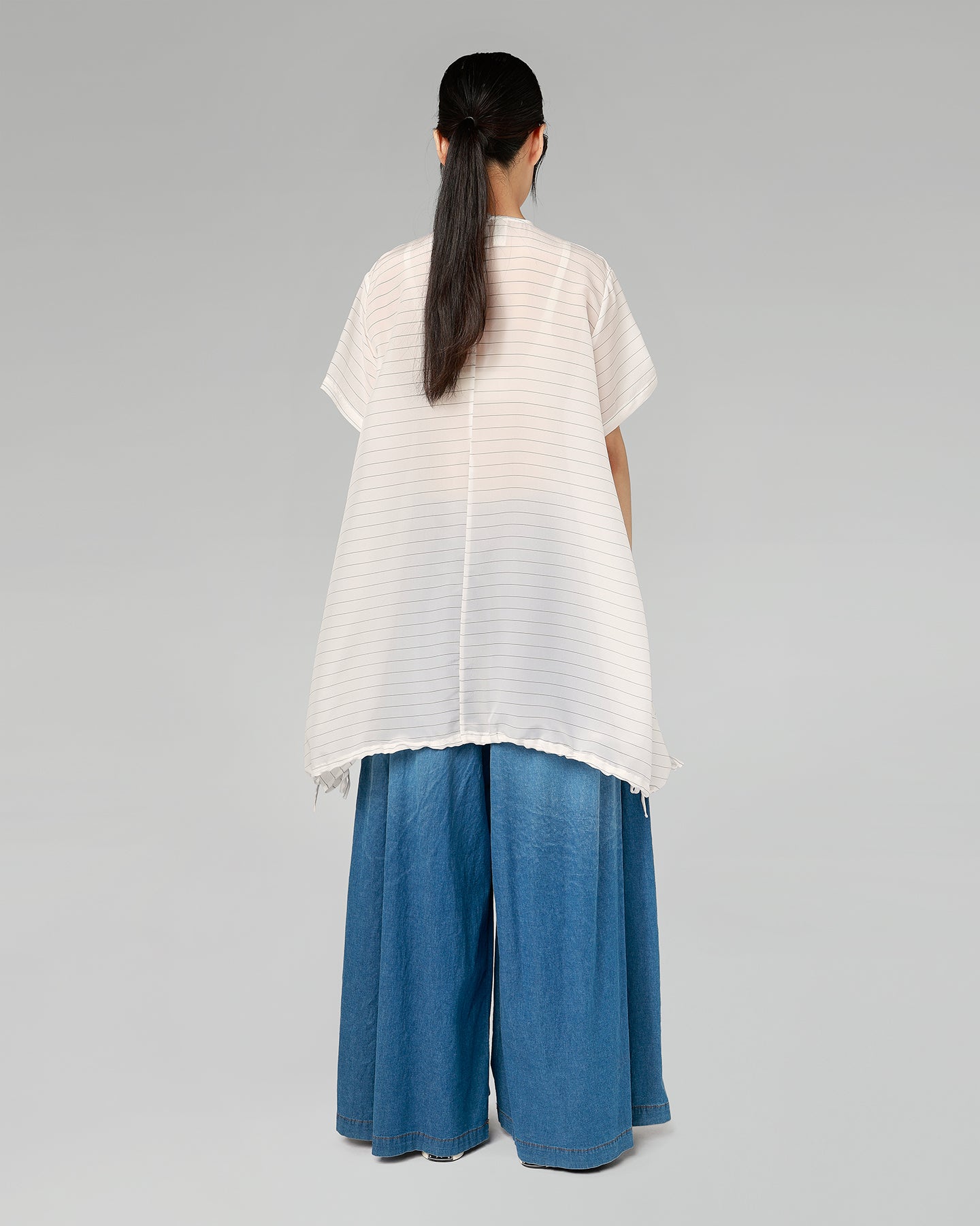 FLARED LIGHT DENIM TROUSERS