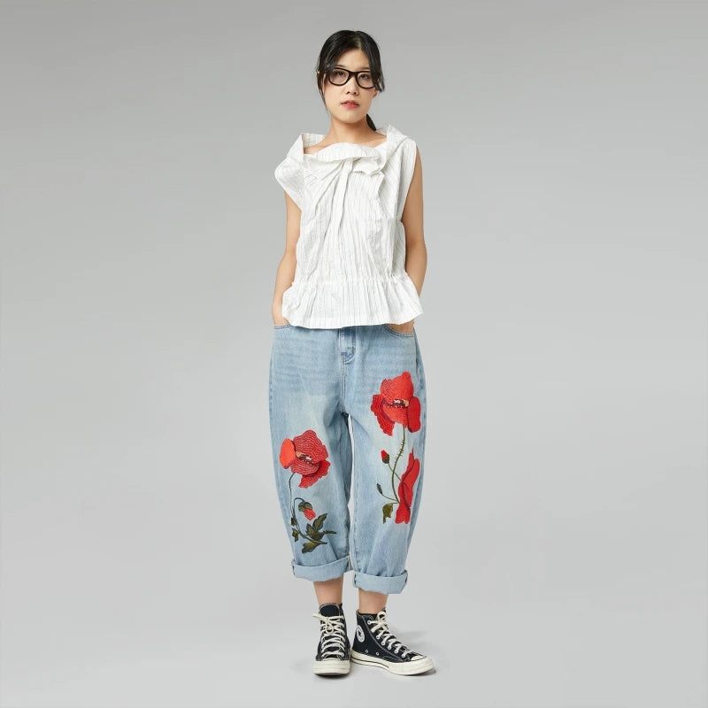 JEANS AVEC BRODERIE COQUELICOT