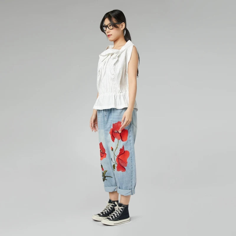 DŻINSY Z HAFTEM MAKÓW